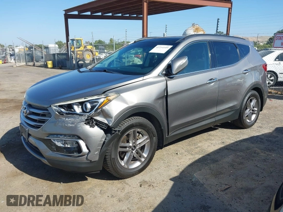 2017 Hyundai Santa Fe 2.4L z VIN 5XYZU3LB4HG446961, wystawiony jako IAAI lot #42214109 z przebiegiem 140 175 mil mil oraz . Historia ofert i sprzedaży dostępna na DreamBid. Obrazek 2.