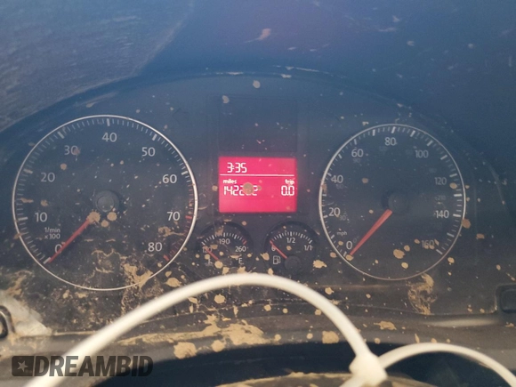 2009 Volkswagen Rabbit S with VIN WVWAB71K29W124868, listed as a Copart auction lot 62224655 with 142,262 mi miles and Salvage title. Bid and sale history available at DreamBid. Image 9.