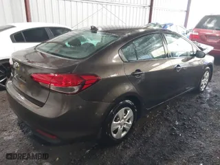 2017 Kia Forte LX with VIN 3KPFK4A75HE145707, listed as a IAAI auction lot 41808305 with 107,457 mi miles. Bid and sale history available at carsss.com. Image 4.