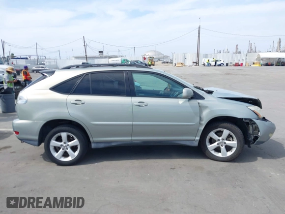 2004 Lexus RX 330 with VIN 2T2HA31U04C038483, listed as a IAAI auction lot 42025073 with 128,047 mi miles. Bid and sale history available at carsss.com. Image 13.