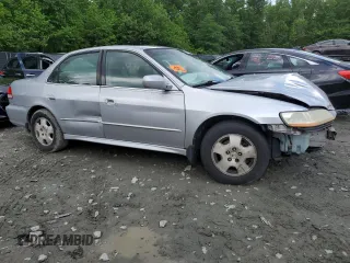 2002 Honda Accord EX z VIN 1HGCG16572A037353, wystawiony jako Copart lot #56564675 z przebiegiem Nie podano mil oraz Szkoda całkowita • Salvage title. Historia ofert i sprzedaży dostępna na DreamBid. Obrazek 4.