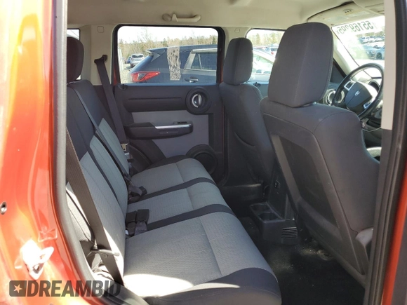 2007 Dodge Nitro SLT z VIN 1D8GU58K07W723331, wystawiony jako Copart lot #55169295 z przebiegiem 242 670 mil mil oraz Czysty tytuł • Clean title. Historia ofert i sprzedaży dostępna na DreamBid. Obrazek 11.