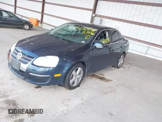 2009 Volkswagen Jetta SE with VIN 3VWRZ71K69M145816, listed as a IAAI auction lot 42607382 with 207,419 mi miles and . Bid and sale history available at DreamBid. Image 2.