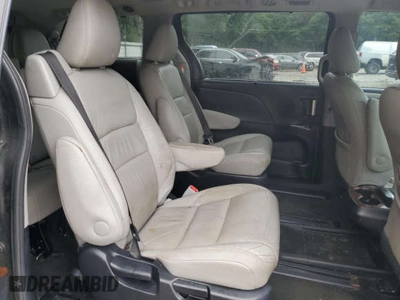 2016 Toyota Sienna XLE с VIN 5TDYK3DC8GS749610, выставлен на аукционе Copart как лот 57579215 с пробегом 167 554 миль миль и Списание • Salvage title. История ставок и продаж доступна на DreamBid. Изображение 11.