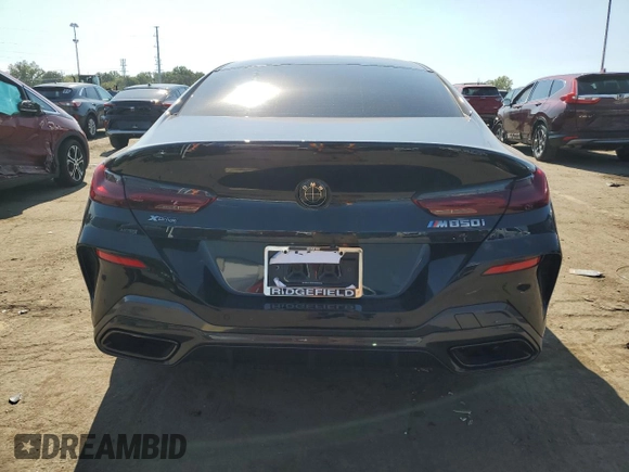 2022 BMW 8 Series M850i z VIN WBAGV8C03NCH58172, wystawiony jako Copart lot #71592504 z przebiegiem 25 854 mil mil oraz Czysty tytuł • Clean title. Historia ofert i sprzedaży dostępna na DreamBid. Obrazek 6.