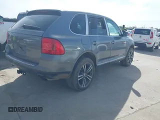 2004 Porsche Cayenne with VIN WP1AA29P44LA21532, listed as a IAAI auction lot 41820496 with 202,160 mi miles. Bid and sale history available at carsss.com. Image 4.