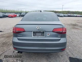 2016 Volkswagen Jetta Sport z VIN 3VWD17AJ2GM399335, wystawiony jako IAAI lot #42077435 z przebiegiem 92 284 mil mil oraz . Historia ofert i sprzedaży dostępna na DreamBid. Obrazek 16.