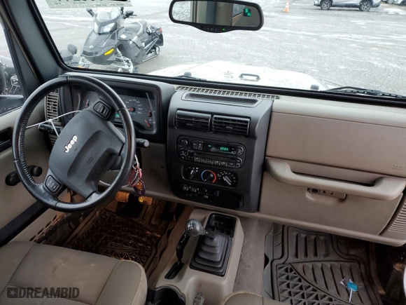 2004 Jeep Wrangler Sahara with VIN 1J4FA59S04P782428, listed as a Copart auction lot 86998244 with 59,447 mi miles and Salvage Title. Bid and sale history available at carsss.com. Image 8.
