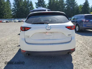 2018 Mazda CX-5 Grand Touring with VIN JM3KFBDM0J0419989, listed as a Copart auction lot 62868005 with 120,217 mi miles and Salvage title. Bid and sale history available at DreamBid. Image 6.