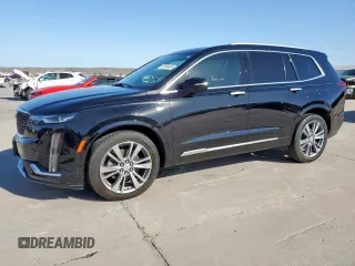 2020 Cadillac XT6 FWD Premium Luxury z VIN 1GYKPCRS7LZ131298, wystawiony jako Copart lot #50196605 z przebiegiem 63 320 mil mil oraz Tytuł czysty. Historia ofert i sprzedaży dostępna na DreamBid. Obrazek 1.
