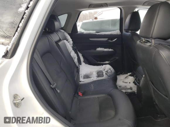 2020 Mazda CX-5 Touring z VIN JM3KFBCM4L0809644, wystawiony jako Copart lot #45048825 z przebiegiem 129 178 mil mil oraz Szkoda całkowita • Salvage title. Historia ofert i sprzedaży dostępna na DreamBid. Obrazek 11.