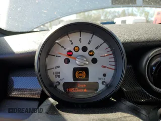 2014 MINI Coupe S z VIN WMWSX3C57ET409158, wystawiony jako Copart lot #81650034 z przebiegiem 118 523 mil mil oraz Szkody całkowita. Historia ofert i sprzedaży dostępna na DreamBid. Obrazek 9.