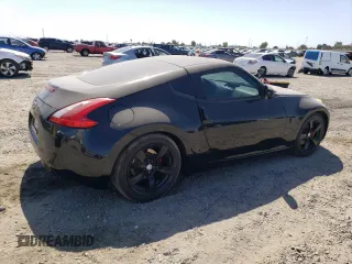 2011 Nissan 370Z Touring z VIN JN1AZ4EHXBM553057, wystawiony jako Copart lot #58557165 z przebiegiem 110 714 mil mil oraz Szkoda całkowita • Salvage title. Historia ofert i sprzedaży dostępna na DreamBid. Obrazek 3.