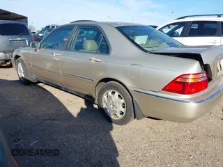 2000 Acura RL w/Navigation System with VIN JH4KA9668YC004134, listed as a IAAI auction lot 41475780 with 212,473 mi miles. Bid and sale history available at carsss.com. Image 3.