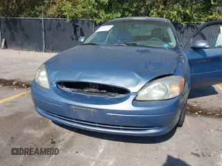 2001 Ford Taurus SEL with VIN 1FAHP56SX1G258514, listed as a IAAI auction lot 40548216 with 170,805 mi miles and . Bid and sale history available at DreamBid. Image 6.