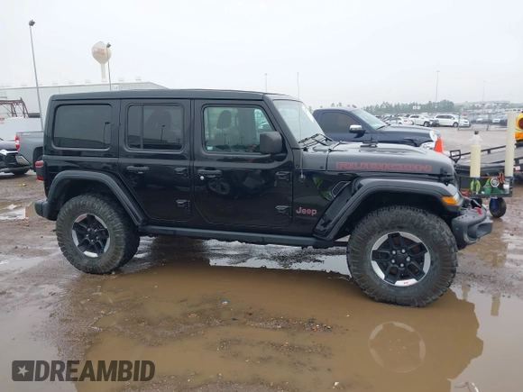 2019 Jeep Wrangler Unlimited Rubicon z VIN 1C4HJXFNXKW511193, wystawiony jako IAAI lot #41452579 z przebiegiem 91 857 mil mil oraz . Historia ofert i sprzedaży dostępna na DreamBid. Obrazek 14.