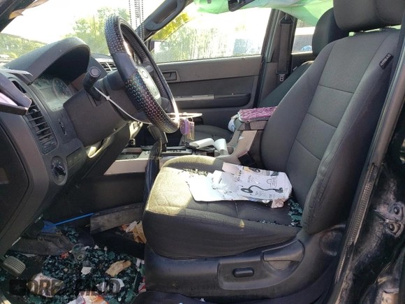 2012 Ford Escape XLT with VIN 1FMCU9DG5CKC54126, listed as a Copart auction lot 58063415 with 158,799 mi miles and Salvage title. Bid and sale history available at DreamBid. Image 7.