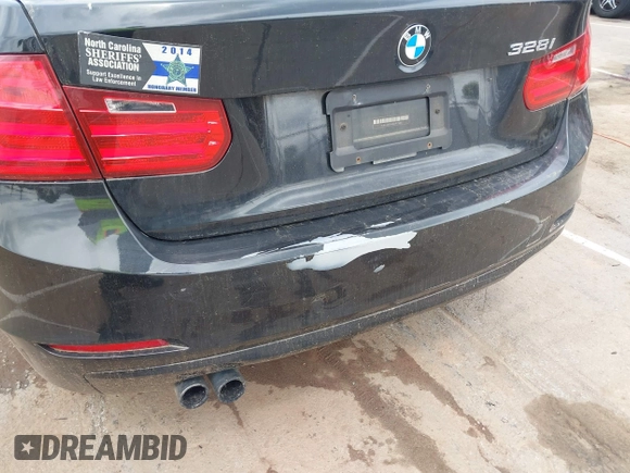 2012 BMW 3 Series 328i with VIN WBA3A5G51CNP17522, listed as a IAAI auction lot 42124868 with 154,385 mi miles and . Bid and sale history available at carsss.com. Image 6.