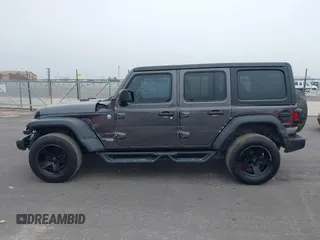 2021 Jeep Wrangler Unlimited Willys with VIN 1C4HJXDM4MW825094, listed as a IAAI auction lot 41515794 with 41,653 mi miles and . Bid and sale history available at DreamBid. Image 14.