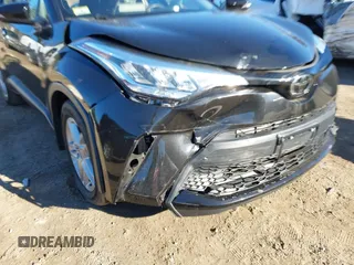 2021 Toyota C-HR LE with VIN NMTKHMBXXMR123633, listed as a IAAI auction lot 40787336 with 28,234 mi miles. Bid and sale history available at carsss.com. Image 6.