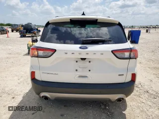 2021 Ford Escape Titanium Hybrid z VIN 1FMCU0DZ6MUA03327, wystawiony jako Copart lot #59558845 z przebiegiem 67 569 mil mil oraz Czysty tytuł • Clean title. Historia ofert i sprzedaży dostępna na DreamBid. Obrazek 6.