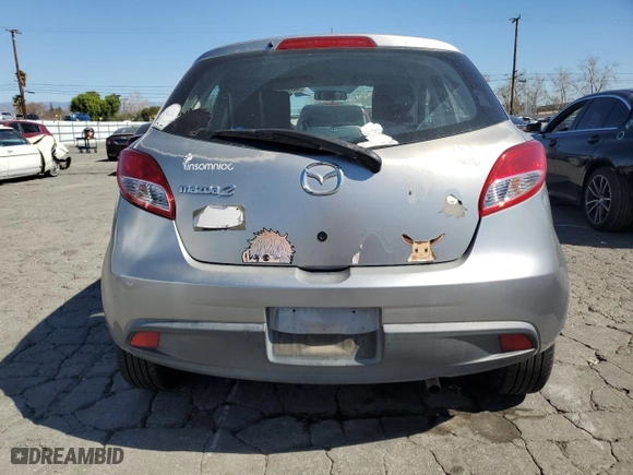2011 Mazda Mazda2 Touring with VIN JM1DE1HZXB0124940, listed as a Copart auction lot 46952395 with 127,694 mi miles and Clean Title. Bid and sale history available at carsss.com. Image 6.