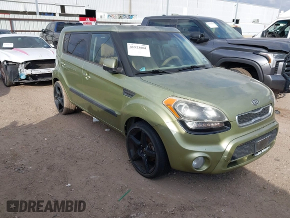 2012 Kia Soul + with VIN KNDJT2A69C7398380, listed as a IAAI auction lot 41523001 with 128,583 mi miles. Bid and sale history available at carsss.com. Image 1.
