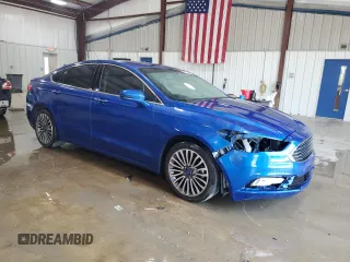 2018 Ford Fusion Titanium с VIN 3FA6P0D90JR159218, выставлен на аукционе Copart как лот 63766945 с пробегом 115 529 миль миль и Списание • Salvage title. История ставок и продаж доступна на DreamBid. Изображение 4.