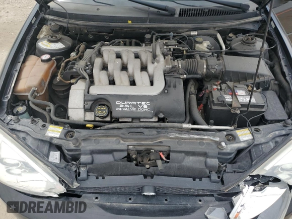 2002 Mercury Cougar z VIN 1ZWFT61L525609449, wystawiony jako Copart lot #72945474 z przebiegiem 156 633 mil mil oraz Szkoda całkowita • Salvage title. Historia ofert i sprzedaży dostępna na DreamBid. Obrazek 11.