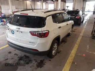 2018 Jeep Compass Sport with VIN 3C4NJCAB6JT124198, listed as a IAAI auction lot 41192196 with 104,557 mi miles. Bid and sale history available at carsss.com. Image 4.