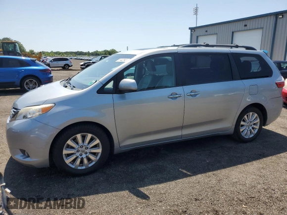 2015 Toyota Sienna Limited with VIN 5TDDK3DC4FS111836, listed as a Copart auction lot 61940595 with 111,579 mi miles and Salvage title. Bid and sale history available at DreamBid. Image 1.