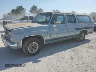 1984 Chevrolet Suburban z VIN 1G8EC16L7EF161366, wystawiony jako Copart lot #76259694 z przebiegiem 81 193 mil mil oraz Czysty tytuł • Clean title. Historia ofert i sprzedaży dostępna na DreamBid. Obrazek 1.