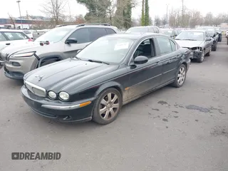 2006 Jaguar X-Type with VIN SAJWA51A16WE68650, listed as a IAAI auction lot 41461291 with 135,332 mi miles and . Bid and sale history available at DreamBid. Image 2.