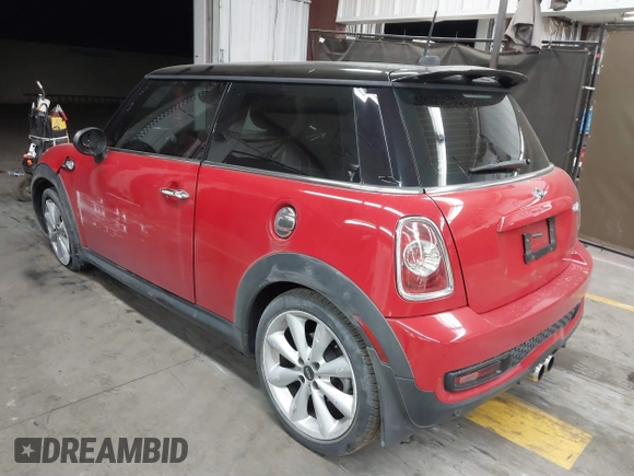 2013 MINI Hardtop S with VIN WMWSV3C50DT392160, listed as a IAAI auction lot 41893232 with 70,922 mi miles and . Bid and sale history available at DreamBid. Image 3.