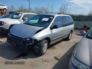 2000 Dodge Caravan SE z VIN 2B4GP45G7YR614145, wystawiony jako IAAI lot #42098834 z przebiegiem 148 924 mil mil oraz . Historia ofert i sprzedaży dostępna na DreamBid. Obrazek 2.