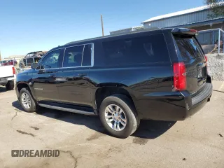 2019 Chevrolet Suburban LS with VIN 1GNSCGKC6KR180042, listed as a Copart auction lot 76829394 with 75,574 mi miles and Salvage title. Bid and sale history available at DreamBid. Image 2.