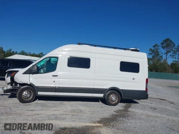 2022 Ford Transit Cargo with VIN 1FTBW3U85NKA01097, listed as a IAAI auction lot 41076643 with 24,786 mi miles and . Bid and sale history available at DreamBid. Image 14.