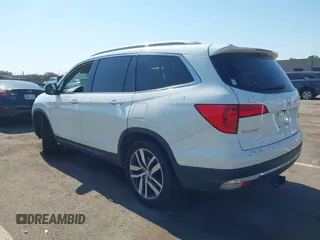 2018 Honda Pilot Touring with VIN 5FNYF6H95JB019122, listed as a IAAI auction lot 42439283 with 128,848 mi miles and . Bid and sale history available at DreamBid. Image 3.