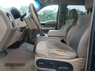 2005 Ford F-150 XLT with VIN 1FTPW145X5KE63882, listed as a Copart auction lot 63299475 with 204,166 mi miles and Salvage title. Bid and sale history available at DreamBid. Image 7.