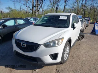 2014 Mazda CX-5 Sport with VIN JM3KE2BE8E0301175, listed as a IAAI auction lot 42051972 with 121,821 mi miles and . Bid and sale history available at carsss.com. Image 2.