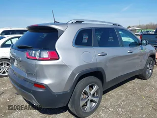 2021 Jeep Cherokee Limited with VIN 1C4PJMDX5MD119056, listed as a IAAI auction lot 41828573 with 56,507 mi miles. Bid and sale history available at carsss.com. Image 4.