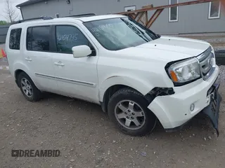 2011 Honda Pilot Touring z VIN 5FNYF4H96BB106873, wystawiony jako IAAI lot #42154795 z przebiegiem 162 282 mil mil oraz . Historia ofert i sprzedaży dostępna na DreamBid. Obrazek 1.