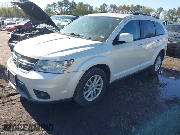 2013 Dodge Journey SXT with VIN 3C4PDCBG1DT563727, listed as a IAAI auction lot 42003852 with 202,516 mi miles and . Bid and sale history available at DreamBid. Image 2.