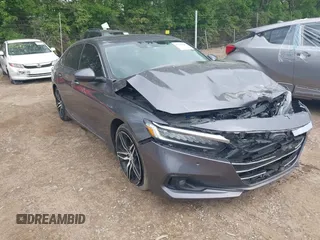 2021 Honda Accord Touring with VIN 1HGCV3F93MA013283, listed as a IAAI auction lot 42232440 with 54,609 mi miles and . Bid and sale history available at DreamBid. Image 1.