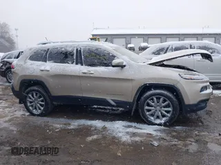 2015 Jeep Cherokee Limited z VIN 1C4PJMDS5FW623361, wystawiony jako IAAI lot #40920356 z przebiegiem 110 989 mil mil oraz . Historia ofert i sprzedaży dostępna na DreamBid. Obrazek 13.