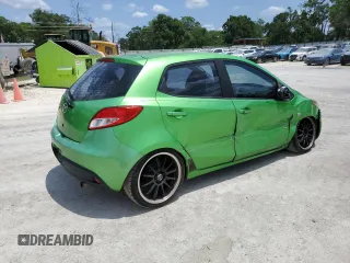 2012 Mazda 2 Sport with VIN JM1DE1KZ5C0141784, listed as a Copart auction lot 56498295 with 132,602 mi miles and Salvage Title. Bid and sale history available at DreamBid. Image 3.