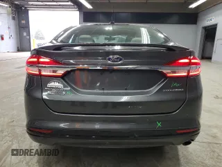 2017 Ford Fusion Titanium z VIN 3FA6P0SU3HR209563, wystawiony jako Copart lot #52039915 z przebiegiem 119 961 mil mil oraz Szkoda całkowita • Salvage title. Historia ofert i sprzedaży dostępna na DreamBid. Obrazek 6.