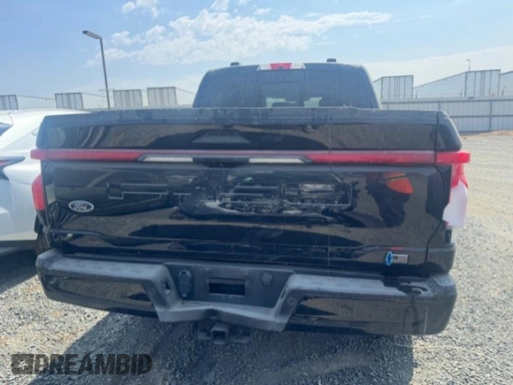 2022 Ford F-150 Lightning Pro z VIN 1FT6W1EV8NWG04113, wystawiony jako Copart lot #51413924 z przebiegiem Nie podano mil oraz Szkoda całkowita • Salvage title. Historia ofert i sprzedaży dostępna na DreamBid. Obrazek 6.