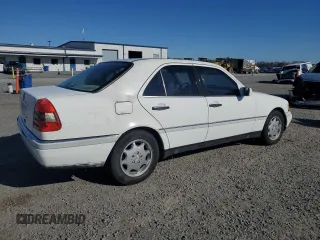 1996 Mercedes-Benz C with VIN WDBHA28E8TF389546, listed as a Copart auction lot 86340144 with 314,364 mi miles and Salvage Title. Bid and sale history available at carsss.com. Image 3.