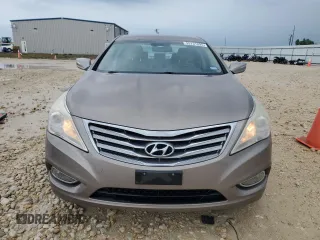 2013 Hyundai Azera z VIN KMHFG4JG5DA254372, wystawiony jako Copart lot #55731895 z przebiegiem 116 549 mil mil oraz Czysty tytuł • Clean title. Historia ofert i sprzedaży dostępna na DreamBid. Obrazek 5.
